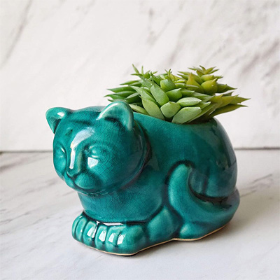 cat planters and pot plants